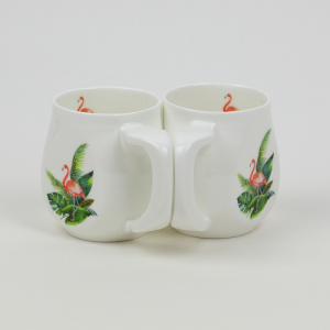 Two flamingo mugs made from fine bone china and mad in Britain.