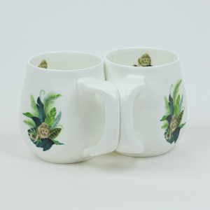 A pair of Leopard mugs made from fine bone china and mad in Britain.