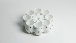 Set of eight coffee mugs by Buddy Mugs